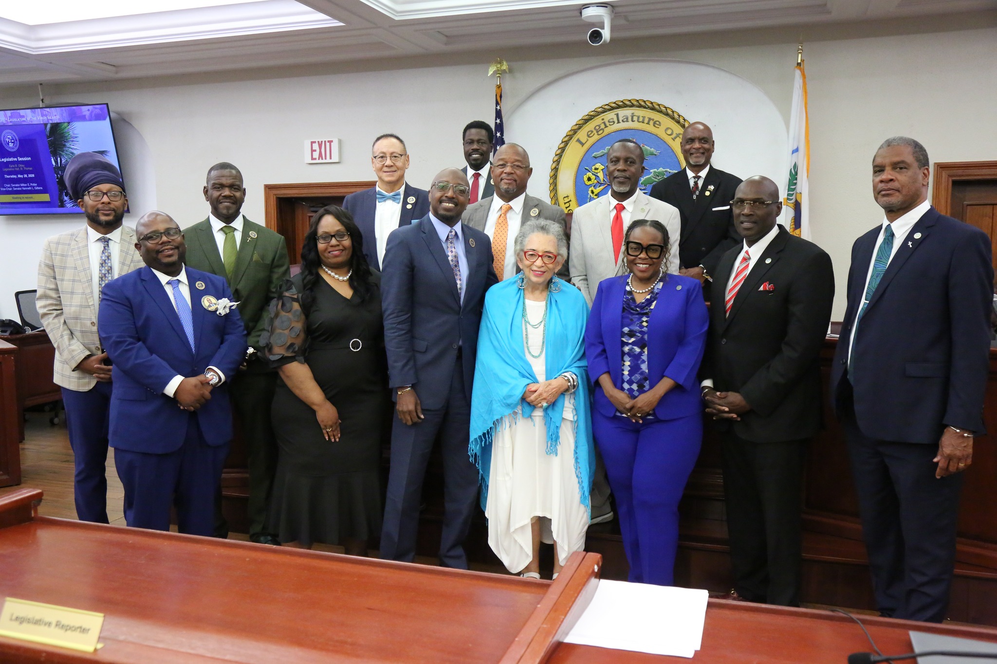 Members of the 36th Legislature of the Virgin Islands pose with Dilsa Capdeville.